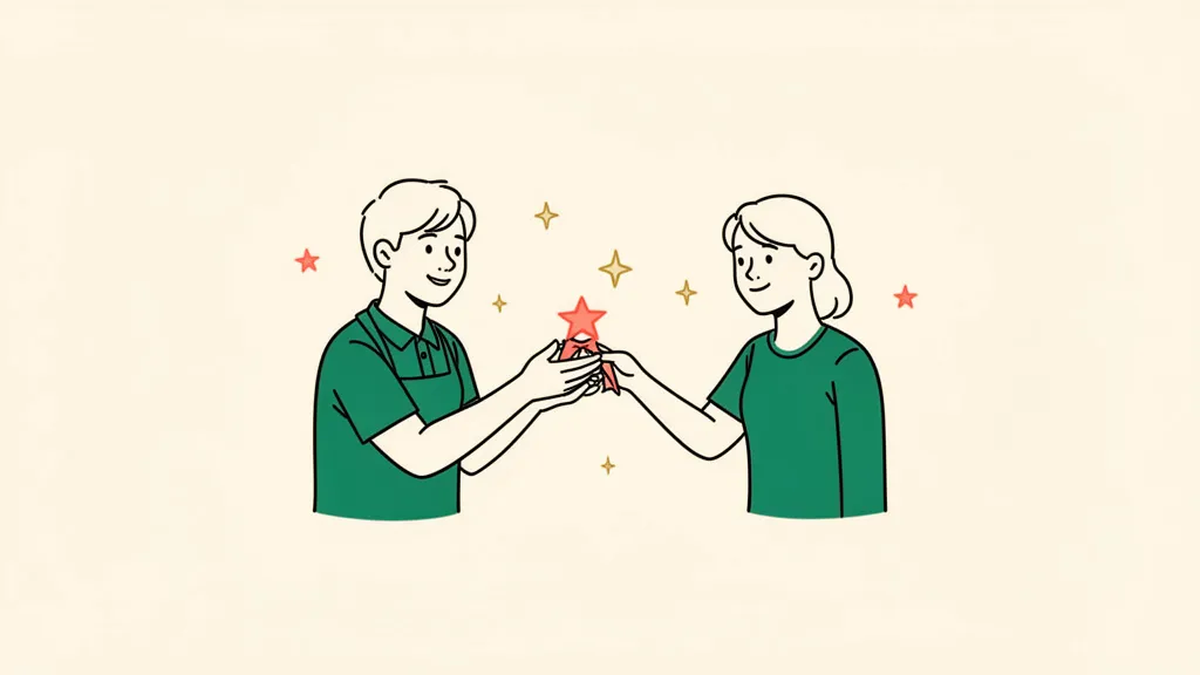Two people sharing a small star-shaped award, surrounded by tiny stars